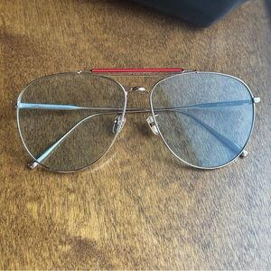 Gentle Monster Gold Sunglasses with Red Accent